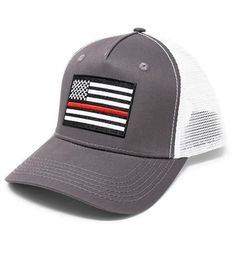 a gray and white trucker hat with an american flag patch on the front of it