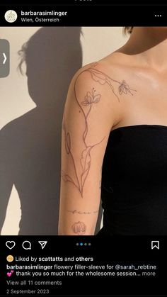 a woman with a flower tattoo on her arm