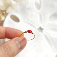 ❤ Tiny Red Coral Ring ❤14K Gold Filled, Rose Gold Filled, Sterling Silver Wire Wrapped Red Coral Ring, Pinky Ring❤ Red coral is the best stone to wear for vitality, energy & ambition. Its bright red color symbolizes blood and planet Mars which can be very powerful & energizing. It is believed to be effective in both prosperity & romantic love ❤ Sizing:• Gemstone Size: 4 mm• Ring Band: 0.8 mm• Handmade in your ring size with a natural gemstone bead and your choice of 14k gold-filled, rose gold-fi Red Dainty Birthstone Jewelry, Dainty Red Birthstone Jewelry, Small Red Jewelry Perfect For Gifting, Dainty Red Round Jewelry, Dainty Red Birthstone Ring In 14k Gold, Red 14k Gold Dainty Birthstone Ring, Small Red Jewelry For Gift, Hypoallergenic Red Round Jewelry, Dainty Tiny Red Jewelry