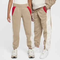 Smooth on the outside but brushed inside for an extra cozy feel, these classic-fit knit pants are an easy pick on days when you want to feel comfy and warm. Knit Trousers, Kid Lifestyle, Heritage Fashion, Nike Kids, Kids Pants, Knit Pants, Side Panels, Big Kids, Nike Air