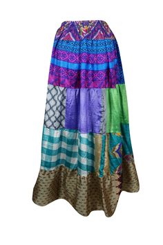 Add a touch of seasonal charm to your wardrobe with this stunning flared maxi skirt! Crafted from upcycled saree fabric in vibrant hues of Purple, Multi and floral prints, this skirt combines eco-conscious fashion with bold style. Its comfortable drawstring waist and flattering ankle-length design make it perfect for everything from farmer's market strolls to dancing at beach festivals. Handmade with care and available in sizes S/M/L, this boho-chic piece is a must-have for any occasion or adven Bohemian Maxi Skirt For Festive Occasions, Multicolor Relaxed Hippie Maxi Skirt, Multicolor Bohemian Maxi Skirt For Festivals, Bohemian Multicolor Maxi Skirt For Festivals, Multicolor Relaxed Fit Maxi Skirt Hippie Style, Hippie Style Multicolor Relaxed Maxi Skirt, Bohemian Maxi Skirt For Summer Festivals, Traditional Multicolor Maxi Skirt, Traditional Multicolor Flowy Maxi Skirt