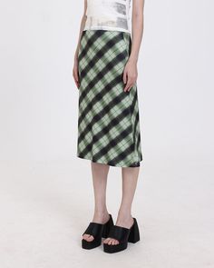 Model (WearingS):• Height: 175cm | Bust: 78cm | Waist: 57cm | Hips: 86cmDetails: Matching color plaid long skirtSkirt Length: LongMaterials:95% Polyester + 5% Spandex Summer Plaid Pleated Skirt, Plaid Long Skirt For Spring, Plaid Long Cotton Skirt, Plaid Cotton Long Skirt, Long Plaid Cotton Skirt, Spring Plaid Skirt, Plaid Lined Skirt For Spring, Plaid Pencil Skirt For Spring, Plaid Pencil Skirt For Spring Season