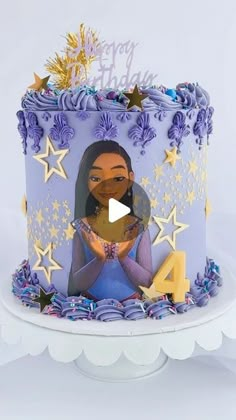 a birthday cake with an image of princess pocahon on top and stars around it