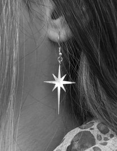 Gold plating or Silver 925 Star Earrings, designed as the star of Bethlehem, which makes them also a perfect Christmas gift. Star Long Dangle Earrings made of 14 karat gold plated brass or strling silver. These unique long dangle earrings feature beautiful matte gold plated over brass star dangling from ear wire. Chic and stylish earrings! These earrings measure approx 35/22 mm from the top of the star to the bottom of the star. Celestial Star Jewelry, Celestial Silver Earrings With Star Charm, Celestial Star-shaped Earrings For Pierced Ears, Star-shaped Single Earring As Gift, Star Shaped Single Earring As Gift, Star Shaped Single Earring For Gift, Minimalist Nickel-free Star-shaped Jewelry, Minimalist Nickel-free Star Shaped Jewelry, Minimalist Nickel-free Star Jewelry