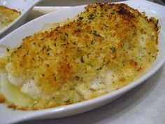 a close up of a casserole dish on a table