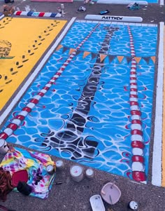 an outdoor swimming pool painted on the ground