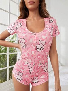 Discover whimsical comfort with our Button-Front Cartoon Rabbit Printed Sleep Romper. Embrace playfulness in every detail with its charming rabbit print. Crafted from a cozy knitted fabric, its short sleeves and slight stretch offer a perfect fit. Express your unique style effortlessly. Features: Details: Button-Front Pattern Type: Cartoon, Rabbit Print Sleeve Length: Short Sleeve Sleeve Type: Regular Sleeve Length: Short Fabric: Slight Stretch Material: Knitted Fabric Composition: 95% Polyester Casual Cartoon Print Short Sleeve Sleepwear, Casual Short Sleeve Cartoon Print Sleepwear, Playful Fitted Short Sleeve Sleepwear, Casual Sleepwear With Button Closure And Short Sleeves, Short Sleeve Cartoon Print Sleep Top, Casual Cartoon Print Sleep Top, Casual Sleep Tops With Cartoon Print, Casual Printed Fitted Sleepwear, Fitted Printed Casual Sleepwear