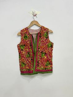 Indian Handmade Women's Embroidered Phulkari Jacket, Sleeveless Embroidered Jacket For Women, Bohemian Waistcoat For Her Product Detail Color:- As Shown In Picture Material:- Fulkari, Embroidered, Cotton Length:- 23inch / 60cm Bust:- 40inch / 102cm Arm Hole:- 10inch / 52cm NOTE : Product color may slightly vary due to photographic lighting sources or your monitor settings. Sleeveless Nehru Jacket With Resham Embroidery, Embroidered Sleeveless Nehru Jacket For Festive Occasions, Spring Sleeveless Nehru Jacket With Chikankari Embroidery, Sleeveless Outerwear With Floral Embroidery For Spring, Sleeveless Spring Outerwear With Floral Embroidery, Sleeveless Floral Embroidered Spring Outerwear, Sleeveless Floral Embroidery Spring Outerwear, Cotton Sleeveless Nehru Jacket For Festive Occasions, Festive Cotton Sleeveless Nehru Jacket