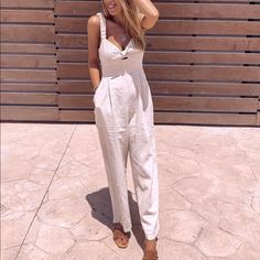 Cotton High-waist Jumpsuits And Rompers For Vacation, Chic Overall Bottoms For Vacation, High Waist Solid Jumpsuits And Rompers For Summer, Chic Vacation Overalls, Chic Beach Jumpsuits And Rompers With Pockets, Summer Overalls For Day Out, Summer High-waist Jumpsuit For Vacation, Summer High-waist Vacation Jumpsuit, Summer High Waist Vacation Jumpsuit