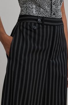 A wide-leg silhouette defines these cotton-blend twill pants patterned in classic stripesfor an ultrasophisticated look. Zip fly with button-tab closure Side-seam pockets; back welt pockets 53% cotton, 31% modal, 16% nylon Hand wash, line dry Imported Classic Black Pants With Vertical Stripes, Classic Striped Wide-leg Pants, Tailored Black Bottoms With Vertical Stripes, Classic Pinstripe Wide-leg Bottoms, Classic Vertical Stripes Workwear Bottoms, Classic Workwear Bottoms With Vertical Stripes, Classic Straight Pants With Vertical Stripes, Tailored Striped Bottoms With Belt Loops, Classic Striped Ankle-length Pants