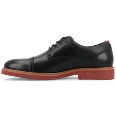 The Dexter derby shoe from Vance Co. seamlessly combines sophistication and comfort with its 1-inch block heel, lace-up closure, and classic round toe design. Crafted from faux leather this style offers a stylish and versatile option. The mesh lining, 6 mm Tru Comfort Foam™ footbed, and rubber outer sole ensure breathability and cushioned support, making the Dexter a well-rounded choice for various occasions. Classic Black Lace-up Derby Shoes, Black Lace-up Dress Shoes For Derby, Goodyear Welted Derby Shoes For Business Casual, Goodyear Welted Business Casual Derby Shoes, Cap Toe Derby Shoes With Rubber Sole For Work, Business Casual Lace-up Oxfords With Goodyear Welt, Black Derby Shoes With Goodyear Welt For Work, Derby Oxford Shoes With Rubber Heel Cap For Work, Black Derby Shoes With Brogue Detailing And Round Toe