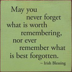 a green sign that says, may you never forget what is worth to be remembers