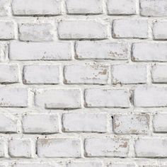 an old white brick wall textured with cement