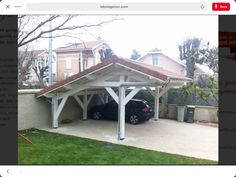 a car is parked under a covered carport