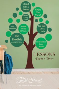 This easy to install vinyl wall art of "Lessons from a tree" adds a colorful element to the walls of a school classroom. The inspirational messages read: Stand tall and proud. Enjoy the view. Think Long Term. Go out on a limb. Stay grounded. Drink plenty of water. Be Flexible. Bend, don't break. Remember your roots. Shown with chocolate brown tree trunk and lime green and forest green polka dot circles that can be placed as desired during install in any creative pattern. Sized 48" x 60" as shown Tree On Wall Classroom, How To Make A Large Tree For Classroom, 3d Tree On Wall Classroom, Paper Tree Classroom Wall, School Wall Painting Ideas Classroom Tree, Educational Decor, Wall Decor Decals, Library Wall, Tree Decals