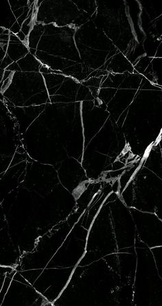 black and white marble textured background with the words original emmi blog on it