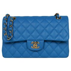 Chanel Blue Caviar Leather Quilted Small Double Flap Classic Bag Made In: France Year of Production: 2021 Color: Blye Hardware: Goldtone Materials: Caviar Leather Lining: Blue leather Closure/Opening: Top flap with CC turnlock Exterior Pockets: One flat pocket Interior Pockets: One zip pocket under flap, three flat pockets, one small pocket. Exterior Condition: Like new Interior Condition: Like new Includes: Dustbag, tag, authenticity card Measurements: 9" x 5.5" x 2.5" Double Strap Drop: 9.5" S Chanel 2019, Classic Flap Bag, Iridescent Blue, Handbags Affordable, Classic Handbags, Chevron Quilt, Bag Collection, Classic Bags, Purse Accessories