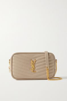 Find SAINT LAURENT Lou Mini Matelassé Leather Shoulder Bag on Editorialist. The SAINT LAURENT Lou shoulder bag is crafted from matelassé leather and features a gold-tone 'YSL' logo plaque. The bag has a chain strap and is perfect for carrying the essentials. The bag is made in Italy. Ysl Mini Lou, Cream Bags, Saint Laurent Bag, Quilted Leather, Beauty Accessories, Chain Strap, Ysl Bag, Bag Making, Mini Bag