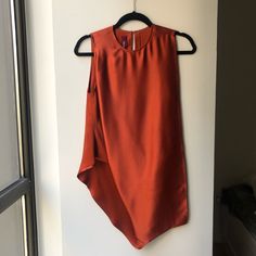 Beautiful Burnt Orange/Brick Red. Brand New With Tags. Looks Great For An Evening Out Or Just Jeans! Elegant Red Asymmetrical Tops, Red Silk Top, Orange Brick, High Windows, Satin Top, Red Silk, Deep Colors, Brick Red, Silk Top