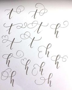 some type of calligraphy written in cursive writing