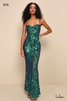 The Lulus Notable Sensation Green Iridescent Sequin Mermaid Maxi Dress is the perfect pick when it comes to making a grand entrance! Stretchy sheer mesh (atop a matching knit liner) is adorned with glowing iridescent sequins that create a mesmerizing design across this stunning mermaid-style gown. Adjustable spaghetti straps support a bustier-inspired bodice with a flirty sweetheart neckline, seamed cups, and supportive boning throughout. The high, fitted waist tops a figure-flaunting skirt that Green Mermaid Prom Dress, Holographic Dress, White Prom Dresses, Inexpensive Prom Dresses, Mermaid Maxi Dress, Prom Dresses Black, Iridescent Sequin, Prom Dresses With Pockets, Affordable Prom Dresses