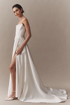 Exclusively for Anthropologie Weddings, the enchanting Watters Allie Gown is the epitome of modern romance with a nod to timeless elegance. Its strapless, corset bodice cinches at the waist, sculpting a figure-flattering silhouette that gently flows into a luxuriously full satin skirt. | Wtoo by Watters Allie Strapless Corset Satin Wedding Gown in White, Women's, Size: 8 at Anthropologie Witchy Wedding Dress, Corset Wedding Dress Mermaid, Satin Corset Wedding Dress, Witchy Dresses, Wtoo By Watters, By Watters, Satin Wedding Gown, Anthropologie Wedding, Strapless Corset