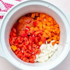 the food in the bowl is ready to be mixed with other ingredients such as carrots and onions