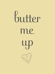 the words butter me up written in black ink on a beige background with a heart