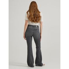 "(Previously known as Vintage Modern High Rise Flare Jean) With enough extra flare-legged fabric to dress an entire decade, our High Rise Flare Jean isn't just a '70s throwback; it's the real deal. Rekindled from patterns in our archives, this high rise creates a beautifully trimmed waistline, followed by a snug-yet-comfortable fit in the seat and thighs and a 33"" inseam length. With a wash inspired by a pair of archived bell bottoms, these look like they walked right outta Woodstock." 99% Cott Retro Flares With Flared Hem, Retro Fitted Flares With Flared Hem, Retro Spring Flares With Flared Hem, Spring Retro Flares, Woodstock 99, Woodstock '99, 80s Jeans, High Rise Flare Jeans, Teddy Jacket