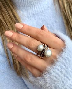 Description : Pearl Stone Cross Silver Ring, Gemstone Ring, Old Style Authentic Ring, Vintage Unique Silver Ring, Mother Day Ring pearl ring, Five Stone Ring, coral pearl ring, mother of pearl ring, 925 silver pearl, pearl silver ring, sterling silver ring, white pearl ring, freshwater pearl, mother of pearl, multi stone ring, pearl ring silver, silver pearl ring Handmade item Materials: Pearl , Silver Gemstone: Pearl,  Gem color: White Band color: Silver/Gold Style: Minimalist Recycled Elegant White Sterling Silver Midi Rings, White Open Band Rings For Gift, Elegant White Hypoallergenic Midi Rings, White Open Band Ring For Gift, White Open Band Ring As Gift, Sterling Silver Open Pearl Ring, Sterling Silver Open Pearl Ring Fine Jewelry, Silver Stackable Open Pearl Ring, White Sterling Silver Stackable Open Rings