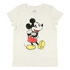 The Mickey Mouse Girls Cute Mickey Pose Kids Graphic Print Short Sleeve T-Shirt is a delightful and playful piece great for young Disney fans. This shirt features a charming graphic of Mickey Mouse in the center, captured in a classic pose with his arms crossed to the right and his left heel on the ground with his toe pointing up. The graphic showcases a distressed print style, adding a vintage and stylish touch that gives the shirt a distinctive look. Crafted from soft, breathable fabric, this Mickey Mouse Characters, Mickey Mouse Shirt, Mickey Mouse Shirts, Top Graphic Tees, Kids Outfits Girls, Print Style, Disney Trip, Tee Shop, Neck Designs