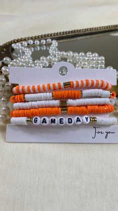 Introducing the Gameday Set of 5 Stretch Bracelets- available in 6 vibrant colors! Brace yourself for the ultimate game day accessory. College Friendship Bracelets, Clay Bead Bracelet Ideas Sports, Game Day Bracelets, Gameday Bracelets, Ohio State Bracelet, School Store Ideas, College Friendship, Clay Making Ideas, Fall Bracelets