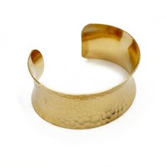 Brass Bracelet - This hammered brass cuff boasts a fascinating texture, a modern concave form, as well an elegant sheen thanks to your choice of electroplated 18k gold or Rhodium silver. Slightly flexible, the cuff can bend to fit most wrist sizes. Elegant Gold Hammered Cuff Bracelet, Elegant Hammered Adjustable Cuff Bracelet, Elegant Hammered Brass Bangle, Elegant Formal Hammered Cuff Bracelet, Elegant Hammered Cuff Bangle, Modern Hammered Cuff Bangle, Gold Hammered Cuff Bracelet Bangle, Elegant Hammered Brass Cuff Bracelet, Modern Hammered Cuff Jewelry