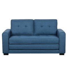 a blue couch sitting on top of a white floor