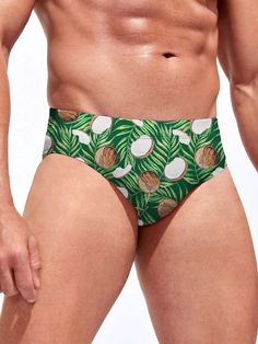 Escape to paradise with our Tropical Print Swim Brief. Embodying the spirit of a tropical getaway, this swim brief features a vibrant and exotic print that transports you to sun-soaked beaches and palm-fringed shores. Made from high-quality, quick-drying fabric, it offers a comfortable and flexible fit for all-day wear. Features: Pattern Type: Fruit & Vegetable Type: Briefs Fabric: Medium Stretch Material: Fabric Care Instructions: Hand wash or professionally dry clean Size Chart ( Inches ): Siz Palm Tree Print Swimwear For Beach Season, Beachwear Swim Trunks With Tropical Print For Vacation, Beachwear Swimwear With Palm Tree Print For Beach Season, Green Palm Tree Print Swimwear For Pool, Summer Surfing Swimwear Brief, Palm Tree Print Beachwear Swimwear For Vacation, Palm Tree Print Beachwear Swimwear, Vacation Beachwear Swimwear With Palm Tree Print, Tropical Style Swim Trunks With Tropical Print