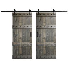 two wooden doors with metal handles on each side and an iron bar at the top