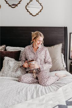 Enjoy a night in the right way with the cutest pajama set. This leopard pajama set includes a long sleeve button down top and pants in a trendy light pink leopard print. Grab a glass of wine, your girlfriends, and a rom-com movie to complete the night. 65% Cotton, 35% Polyester Model is 5'6", size 34B bust, size 26" waist, and shown wearing a size small Fit is true to size Elastic waist band Faux drawstring Leopard Pajamas, Date Night Fashion, Night Fashion, Cute Pajama Sets, Flower Bird, Pullover Cardigan, Spirit Week, Cute Pajamas, Cold Weather Fashion