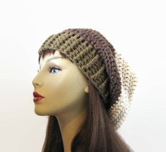 This is made to order I crocheted this with a soft acrylic yarn in shades of brown and beige. It has a nice large slouch and should fit most women, men and teens. Hand wash is recommended. Beige Yarn Crochet Hat For Fall, Beige Crochet Hat For Fall, One Size Cream Crochet Hat, Handmade Brown Crochet Hat In Acrylic Yarn, Brown Crochet Yarn Hat, Brown Crochet Yarn Hat One Size, Brown Crochet Hat In Acrylic Yarn, Beige Hand-knitted Crochet Hat, Hand Knitted One Size Cream Crochet Hat