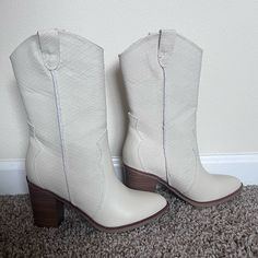 Mid Calf White/Ivory Textured Cowboy Boots. Originally Purchased From Altard State. Size 6. Perfect Condition Never Worn White Mid-calf Boots With Medium Width And High Ankle, White Leather Mid-calf Boots For Spring, White Mid-calf Boots With Medium Width, White Pointed Toe Mid-calf Boots For Spring, Cream Mid-calf Boots For Spring, White Casual Mid-calf Boots For Spring, Casual White Mid-calf Boots For Spring, Cream Ankle-high Western Boots, Cream Round Toe Summer Boots