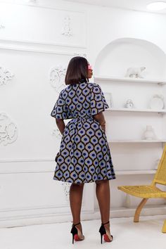 This LALA African Print Flare Sleeve Button Dress is sure to add a lil' va-va-voom to your wardrobe! Its high-quality fabric, fierce pocket detailing, and 'Oh-so-fabulous' flared sleeve make it the perfect fit for any stylish slay queen! Add your favorite slides and a mini bag for a legendary look – we guarantee you wo African Fabric Dress, Slay Queen, Printed Robe, Flare Sleeves, African Print Dresses, Va Va Voom, African Design Dresses, Medium Dress, Church Outfits