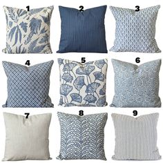 blue and white pillows with different patterns on them