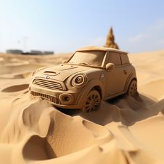 a toy car in the middle of sand dunes