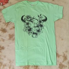 ~New~ Western Style Women's Floral Cow Skull Size X-Small Soft Tshirt. 80% Cotton / 50% Polyester. Floral Cow Skull, Holiday Graphic Tees, Skull T Shirt, Girls Graphic Tee, Cow Skull, Ladies Tee Shirts, Concert Tshirts, Skull Tshirt, Mom Shorts