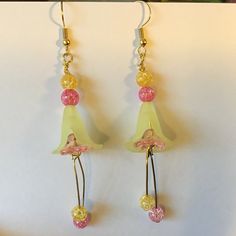 Super lightweight, these cute acrylic pink & yellow bell flower cap and crackle beaded pierced earrings remind me of a dancing fairy! Pair with that cute sundress or jeans & sandals. Adjustable Whimsical Earrings For Summer, Cute Spring Party Earrings, Yellow Dangle Earrings For Spring, Fun Dangle Earrings For Spring, Cute Dangle Flower Earrings For Summer, Spring Party Cute Earrings, Cute Yellow Earrings For Spring, Handmade Whimsical Flower Earrings For Summer, Whimsical Handmade Flower Earrings For Summer