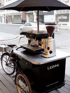 an outdoor coffee cart on the sidewalk