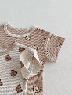 Get cozy with this Baby Bear Waffle Cotton T-shirt and Shorts Set! Made with 100% cotton, this set features a charming teddy bear print and comes in two adorable colors. The perfect outfit for your little bear, available for both baby girls and boys Cotton Bear Print Short Sleeve Tops, Baby Teddy Bear Outfit, Cute Short Sleeve T-shirt With Bear Print, Teddy Bear Print, Cheap Cotton T-shirt With Bear Print, White Short Sleeve T-shirt With Bear Print, Top Skirt Set, Little Bear, Formal Suits