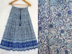 "ITEM DESCRIPTION sky blue little flowery printed cotton long maxi skirts - Indian wear summer long maxi skirts Material: 100% cotton voile soft crinkled fabric Length: - 38 inch long Waist :-28.00 inch full (14 inch half) 28 inch relaxed can stretch up to 50 inch Size: free size (fit to all) PRODUCT NAME: - Long Women Maxi skirts Ladies Vintage Long skirts Company Return Policy: Please write for more information to my email directly CHOOSE \"ASK SELLER QUESTION \" payment policy:- we accepts pa Bohemian Blue Maxi Skirt For Spring, Blue Bohemian Maxi Skirt For Summer, Bohemian Long Skirt In Light Blue, Summer Blue Flowy Maxi Skirt, Light Blue Long Bohemian Skirt, Blue Cotton Maxi Skirt For Spring, Bohemian Light Blue Skirt For Summer, Bohemian Light Blue Summer Skirt, Blue Floral Print Maxi Skirt For The Beach