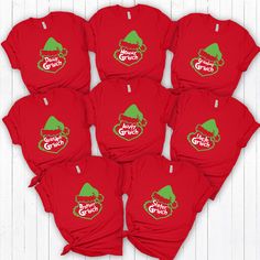 Make this Christmas a Grinchy one – with matching t-shirts for the whole family! Trendy Custom Apparel brings you the perfect way to dress up your family in the funniest Christmas style. The Christmas Family Matching Group Grinch Unisex Graphic Print T-Shirt comes in multiple colors: black, gray, red, and white – and in a range of sizes, from newborn all the way up to adult. It's made from 100% soft cotton, either pre-shrunk, Gerber, Rabbit Skins or Gildan brands, making it perfect for the entir Christmas Style, Matching Tees, Custom Apparel, All The Way Up, Christmas Family, Christmas Fashion, Personalised Kids, Family Matching, Family Christmas