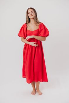 The Hamilton is everything you're looking for in a midi dress - charming, sophisticated, and absolutely flattering. It features premium quality details, like a sweetheart neckline and gorgeous balloon sleeves that can be worn on or off the shoulder. It's an unforgettable choice for every body type, and extra-comfy for expecting mamas! The best part? You can wear this beauty long after your sweet baby arrives! Available in multiple colorways. FIT: Runs true to size. Features a smocked back panel Red Midi Dress With Gathered Sleeves, Fitted Bodice Midi Dress With Sweetheart Neckline For Brunch, Sweetheart Neckline Midi Dress With Fitted Bodice For Brunch, Red Puff Sleeve Dress For Summer Brunch, Red Puff Sleeve Midi Dress For Spring, Chic Red Puff Sleeve Midi Dress, Chic Red Midi Dress With Puff Sleeves, Date Night Dresses With Gathered Sleeves And Sweetheart Neckline, Red Sweetheart Neckline Maxi Dress For Spring