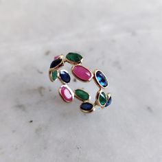 This stunning stackable ring is set in Solid Yellow Gold with Natural Emerald, Ruby and Blue Sapphire. It is an unique & dainty gemstone ring for nearly every occasion and is completely hassle-free jewelry. 🔷ABOUT GEMSTONE:  Emerald is often associated with love and romantic relationships. It is believed to promote love, loyalty, and unity, making it a popular choice for engagement and anniversary jewelry.   ♥ Zodiac: Emerald is commonly associated with the zodiac sign Gemini. ♥ Birthstone Mont Adjustable Multicolor Stackable Rings, Multicolor Ring With Bezel Setting, Multicolor Bezel Set Ring, Multicolor Open Stackable Rings For Promise, Multicolor Stackable Birthstone Ring For Promise, Multicolor Stackable Birthstone Promise Ring, Gemini Birthstone, Sapphire Gem, Gem Ruby